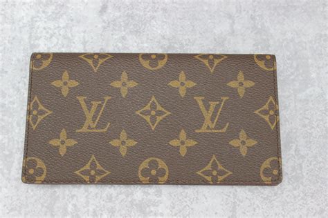 louis vuitton checkbook cover fake